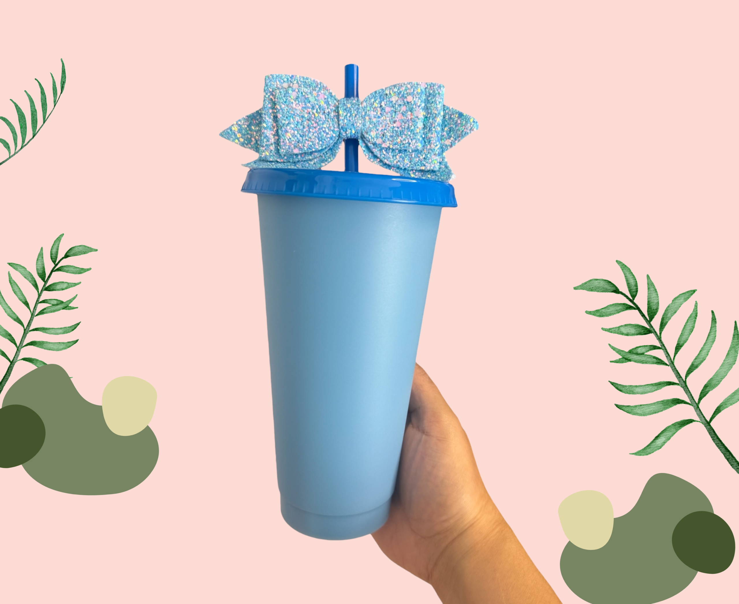 Blue plastic cup with a matching lid, straw and bow