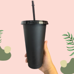 Blank black plastic cup with matching lid and straw